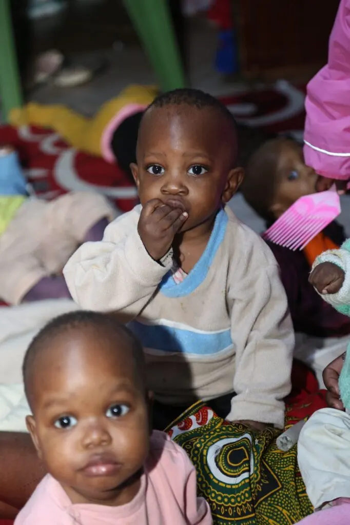 A child smiling at the camera